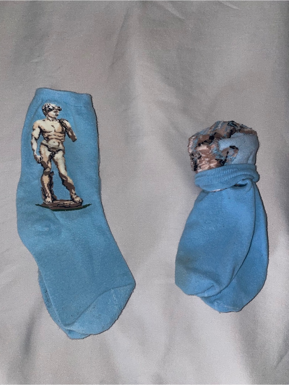 Men's Light Blue Crew Socks with Statue Motif